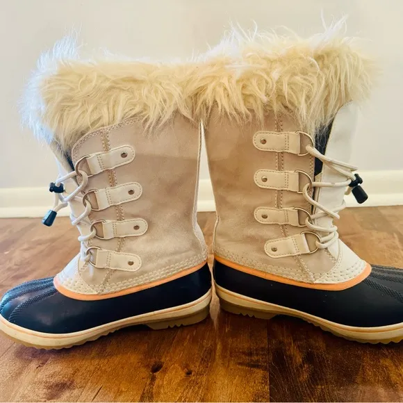 Excellent condition, like new, Sorel Tan and Black Winter Boots with Fur Trim