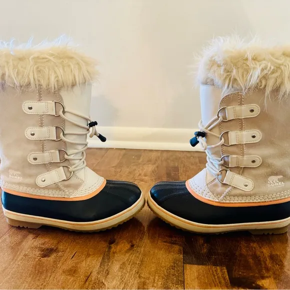 Excellent condition, like new, Sorel Tan and Black Winter Boots with Fur Trim