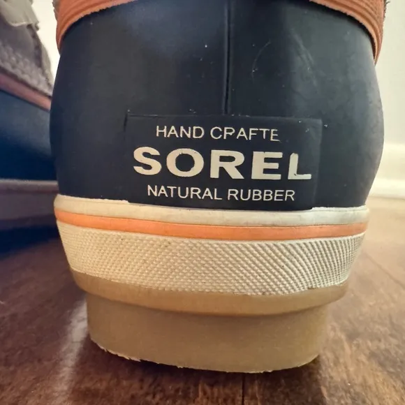 Excellent condition, like new, Sorel Tan and Black Winter Boots with Fur Trim