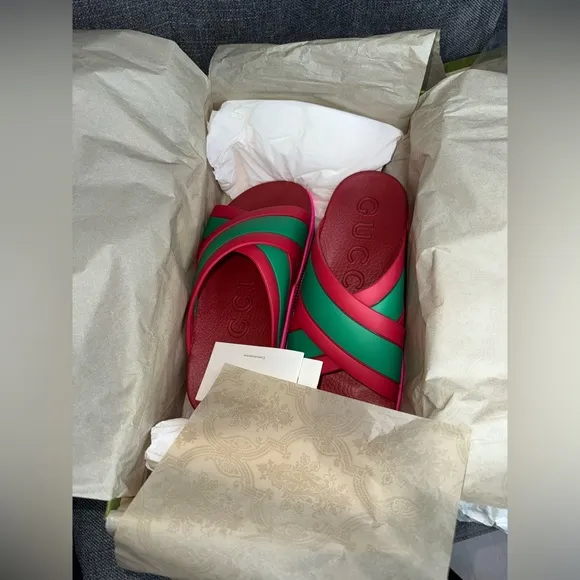 GUCCI web criss cross rubber slides