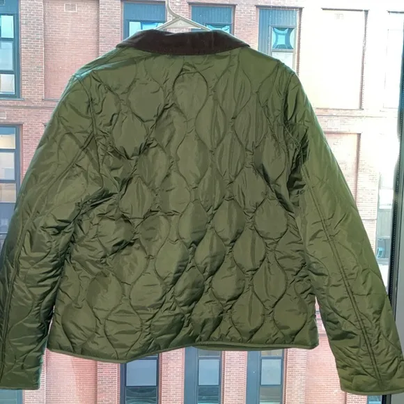 J.Crew quilted barn jacket with brown collar detail and pocket trim detailing.