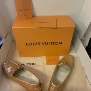 Louis Vuitton Gold flat Loafers 36