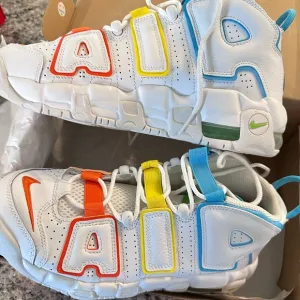 Nike White and Red Sneakers Bold Uptempo Design