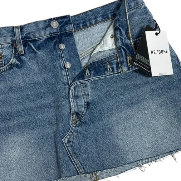 RE/DONE 90s Mini Skirt in faded blues denim Size 28/6