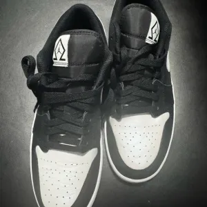 Stylish Black and White Men's Sneakers
