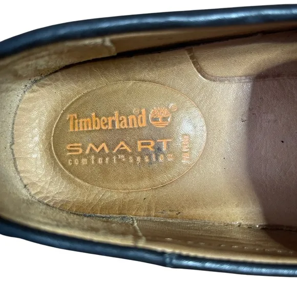 Timberland Black Leather Loafers with Decorative Strap and Rounded Toe